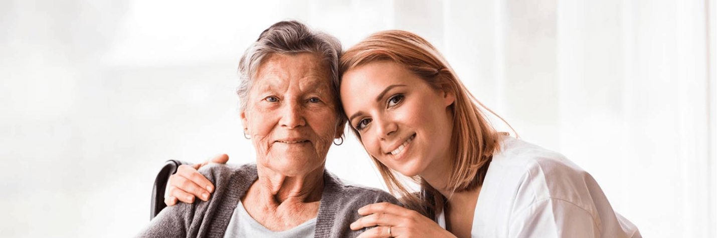 Female nurse taking a photo with her patient