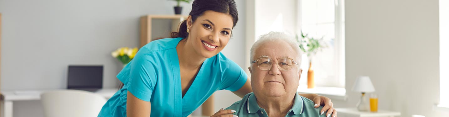 Nurse helping setup medical equipment at his home