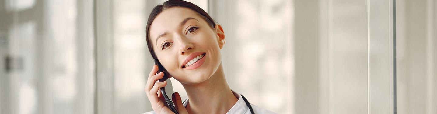 Nurse on the phone making an appointment