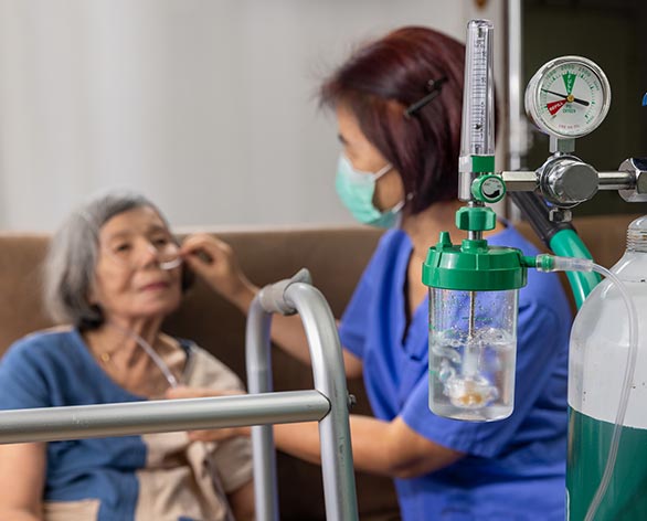 Skilled technician working with patient at home