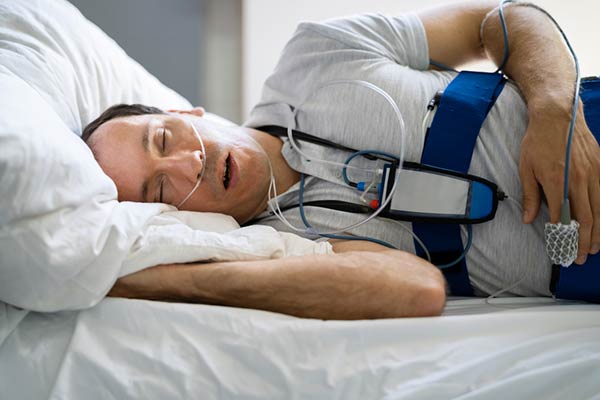 Patient having a sleep test in Doctors office.